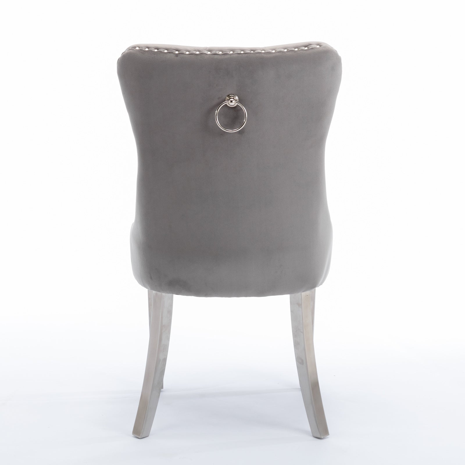 Grey velvet dining chair with silver ring pull and diamond tufting