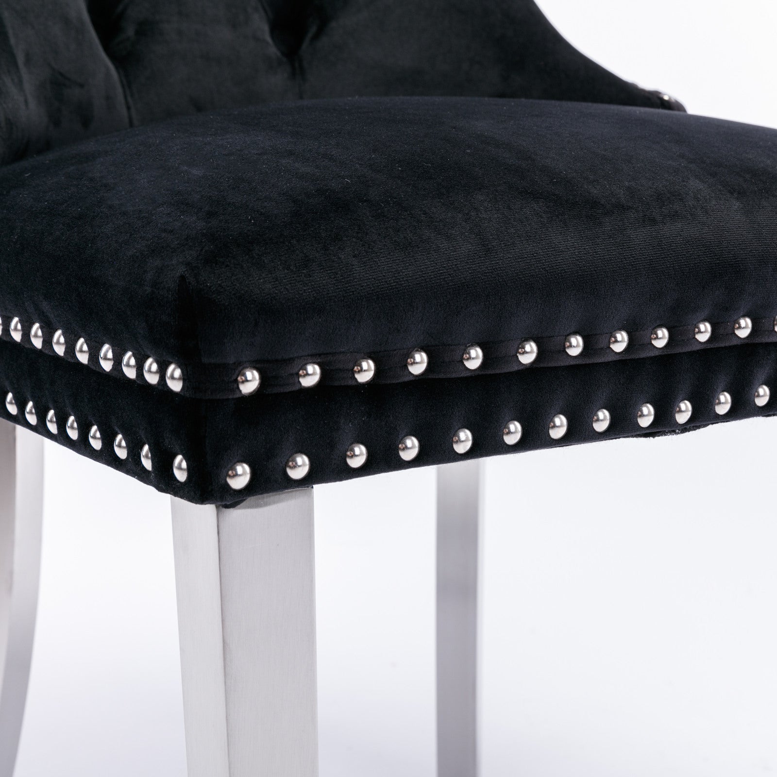Black velvet bar stool with silver nailhead trim and chrome legs