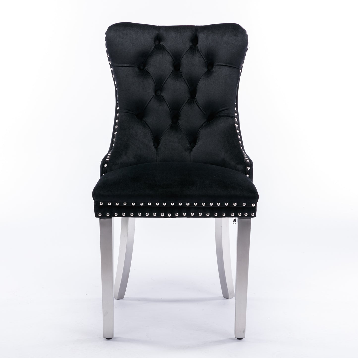 Black velvet dining chair with tufted back and silver nailhead trim