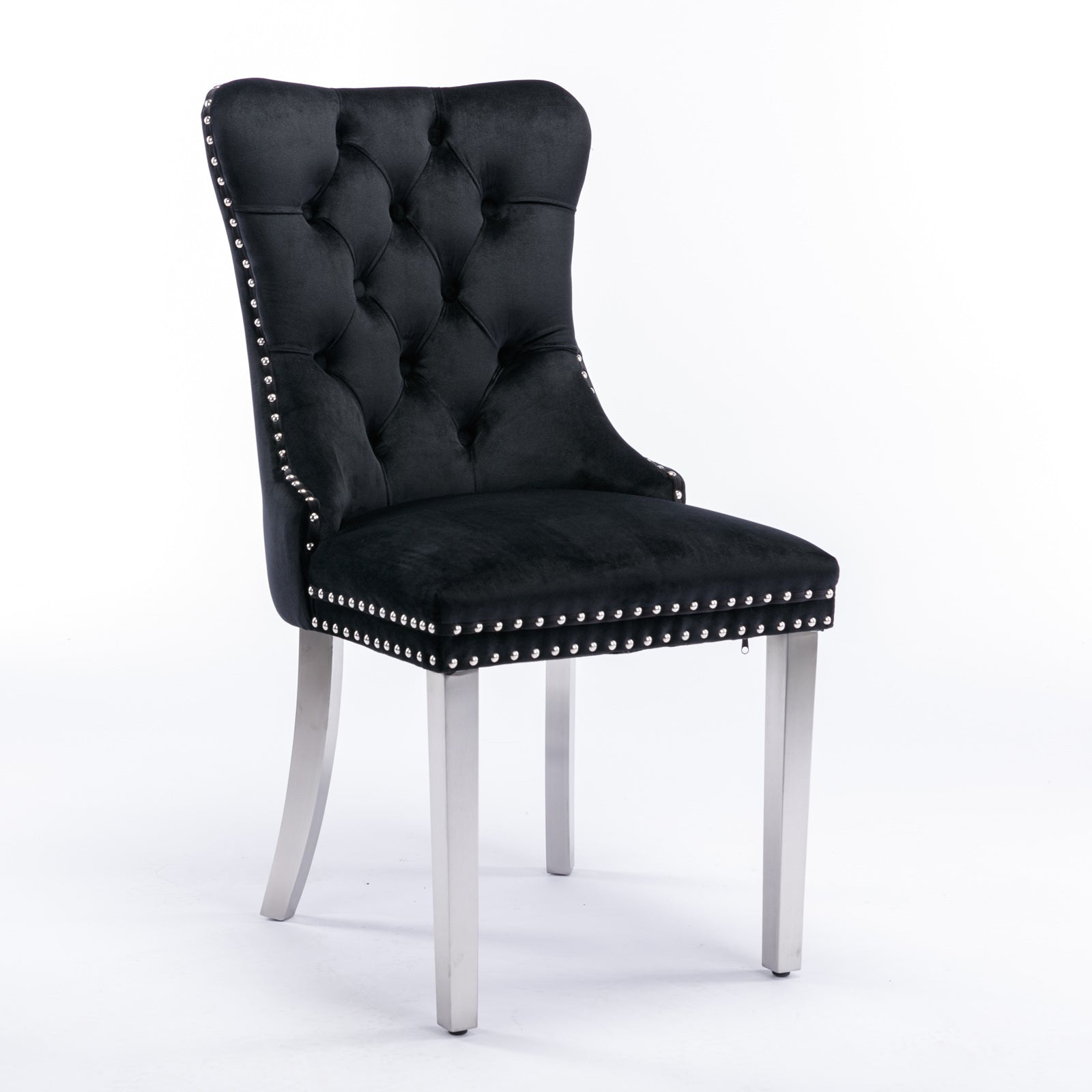 Black velvet accent chair with silver nailhead trim and brushed metal legs