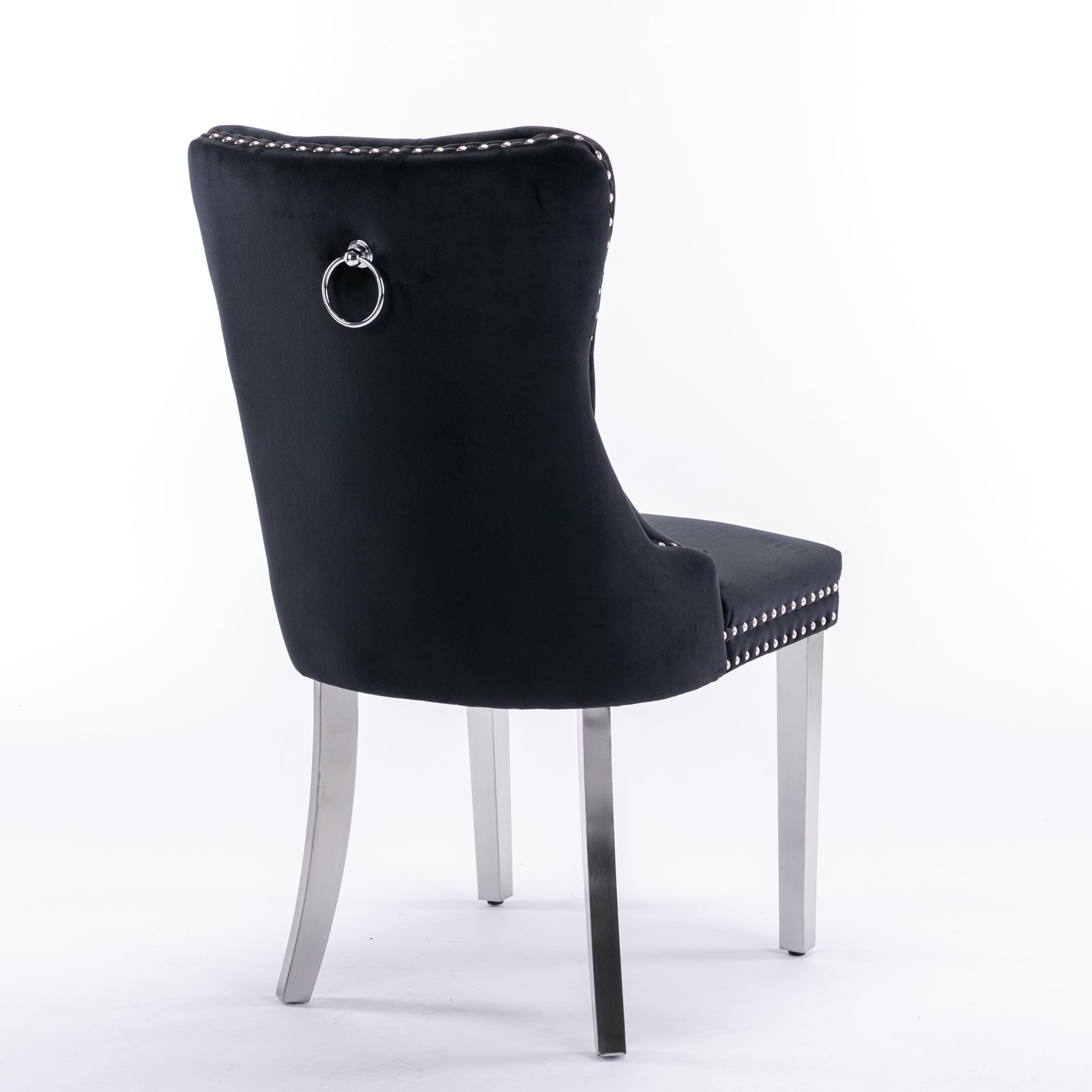Black velvet dining chair with silver nailhead trim and ring pull
