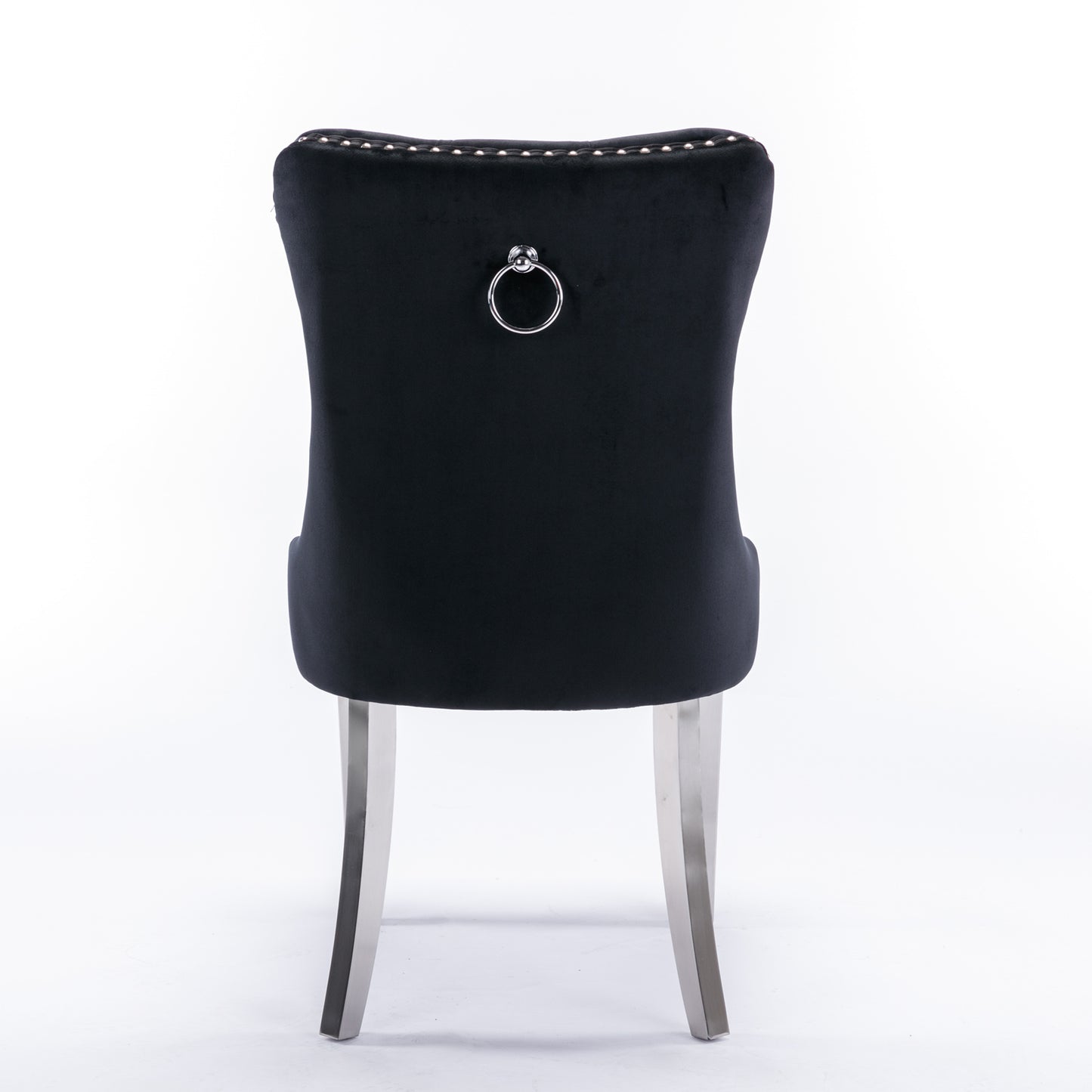 Black velvet dining chair with silver ring detail on back and metal legs