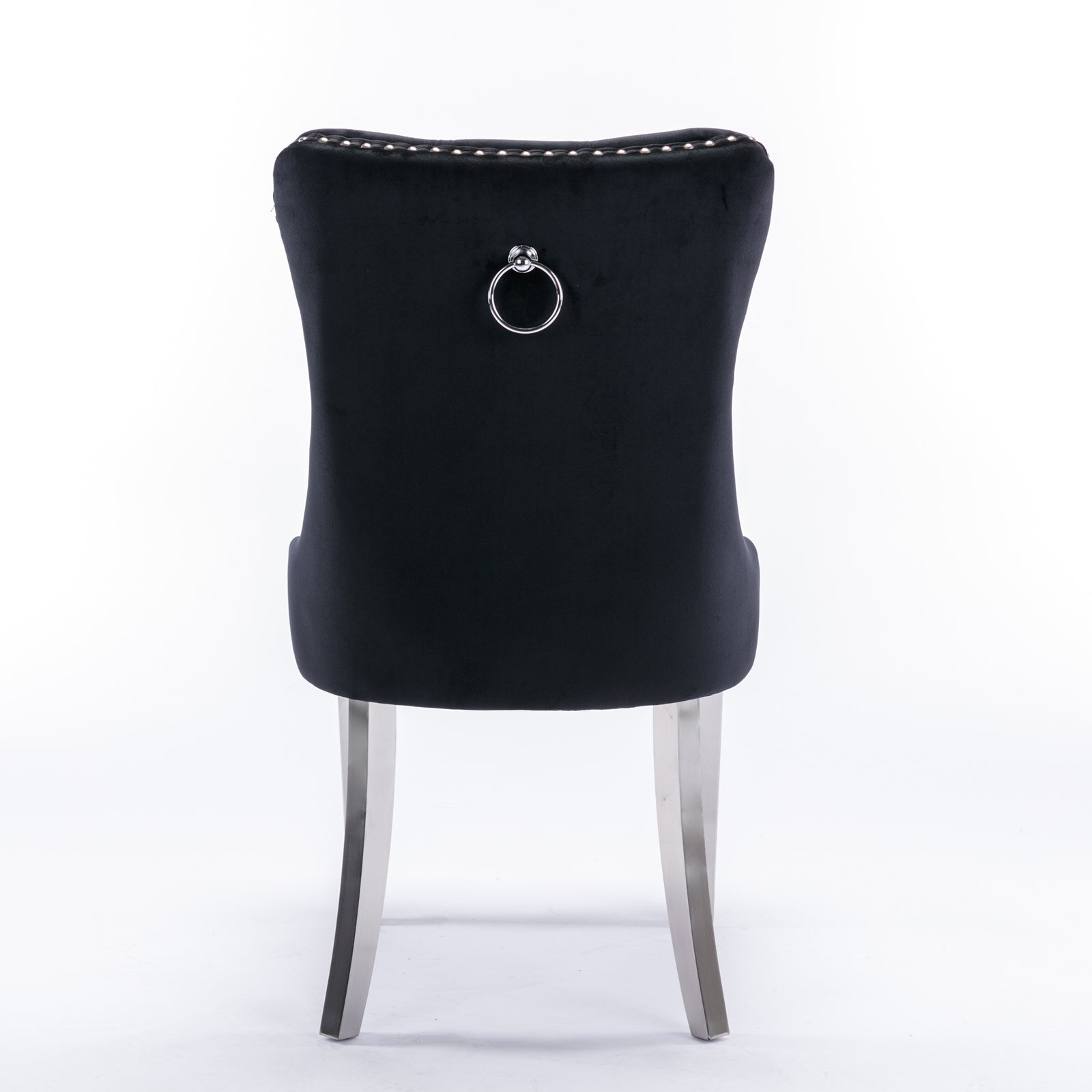 Black velvet dining chair with silver ring detail on back and metal legs