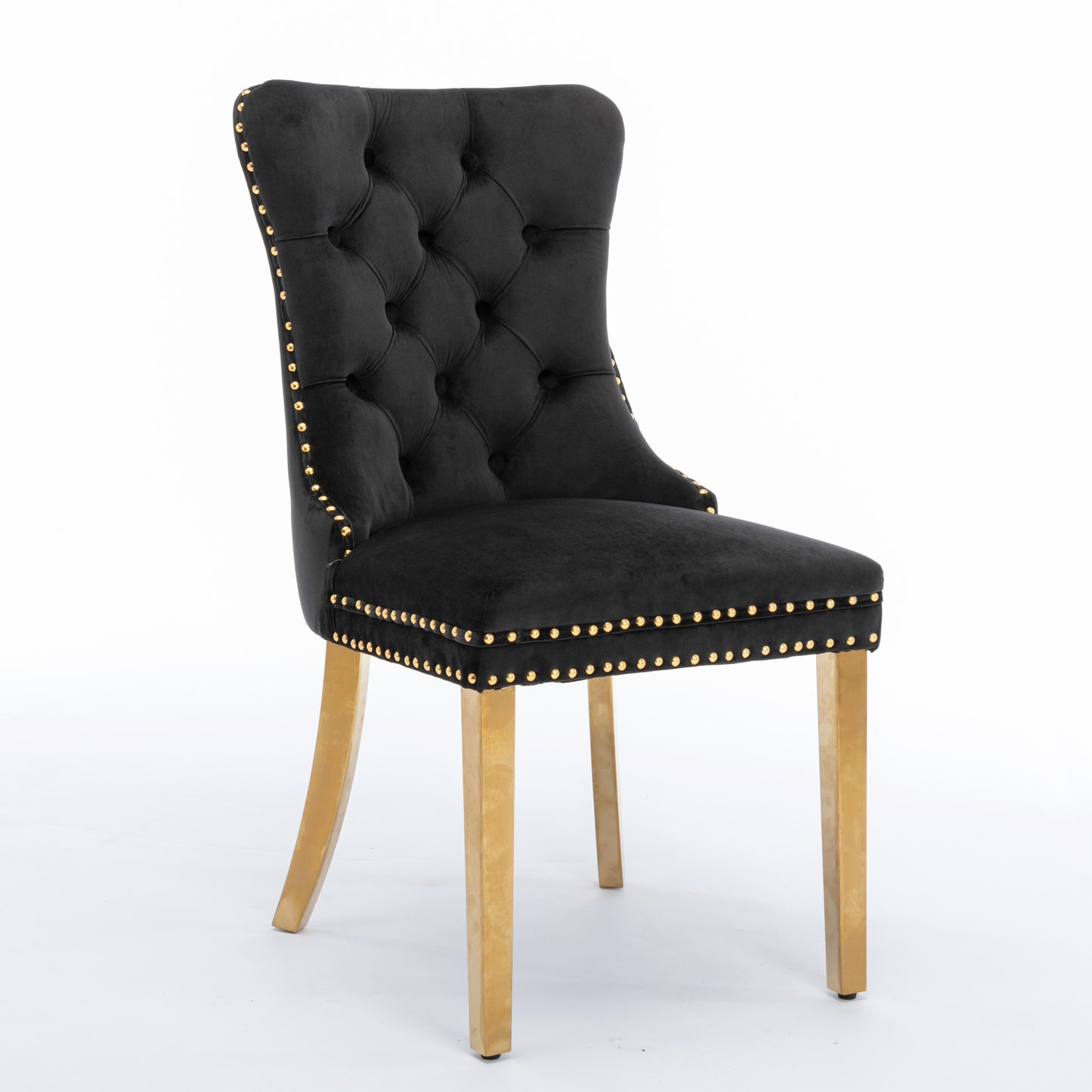 Black velvet dining chair with gold nailhead trim and gold legs