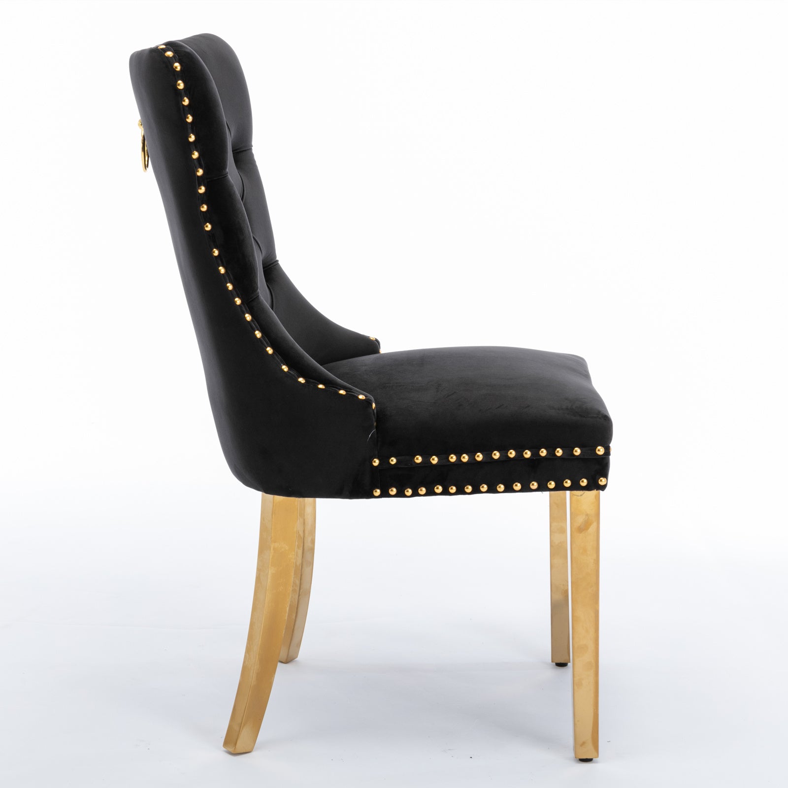 Black velvet dining chair with gold nailhead trim and gold legs