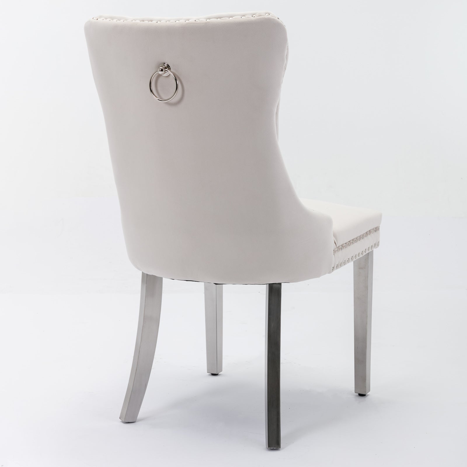 Cream velvet dining chair with silver ring pull and stud trim