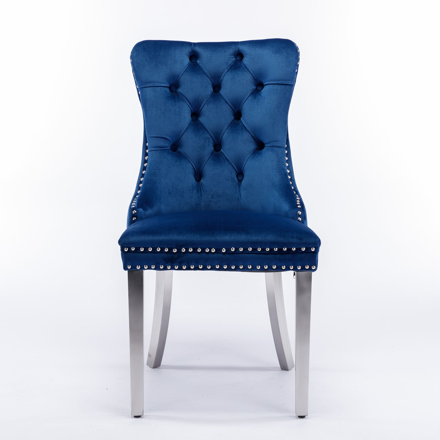 Deep blue velvet dining chair with diamond tufting and silver nailhead trim