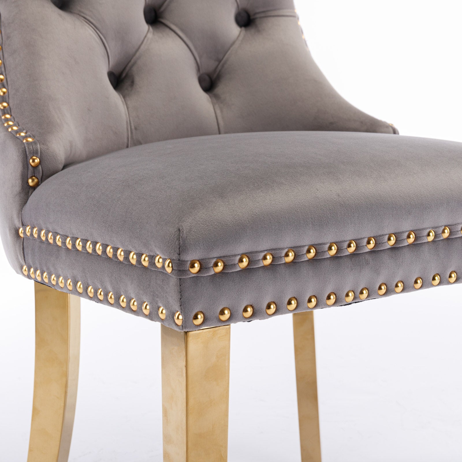 Grey velvet bar stool with gold nailhead trim and gold legs