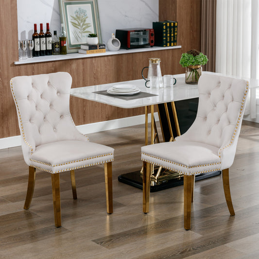 Elegant cream velvet dining chair with diamond tufting and gold nailhead trim