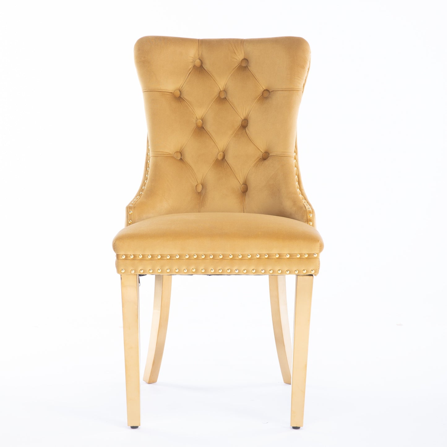 Tufted gold velvet dining chair with brass nailhead trim and gold legs