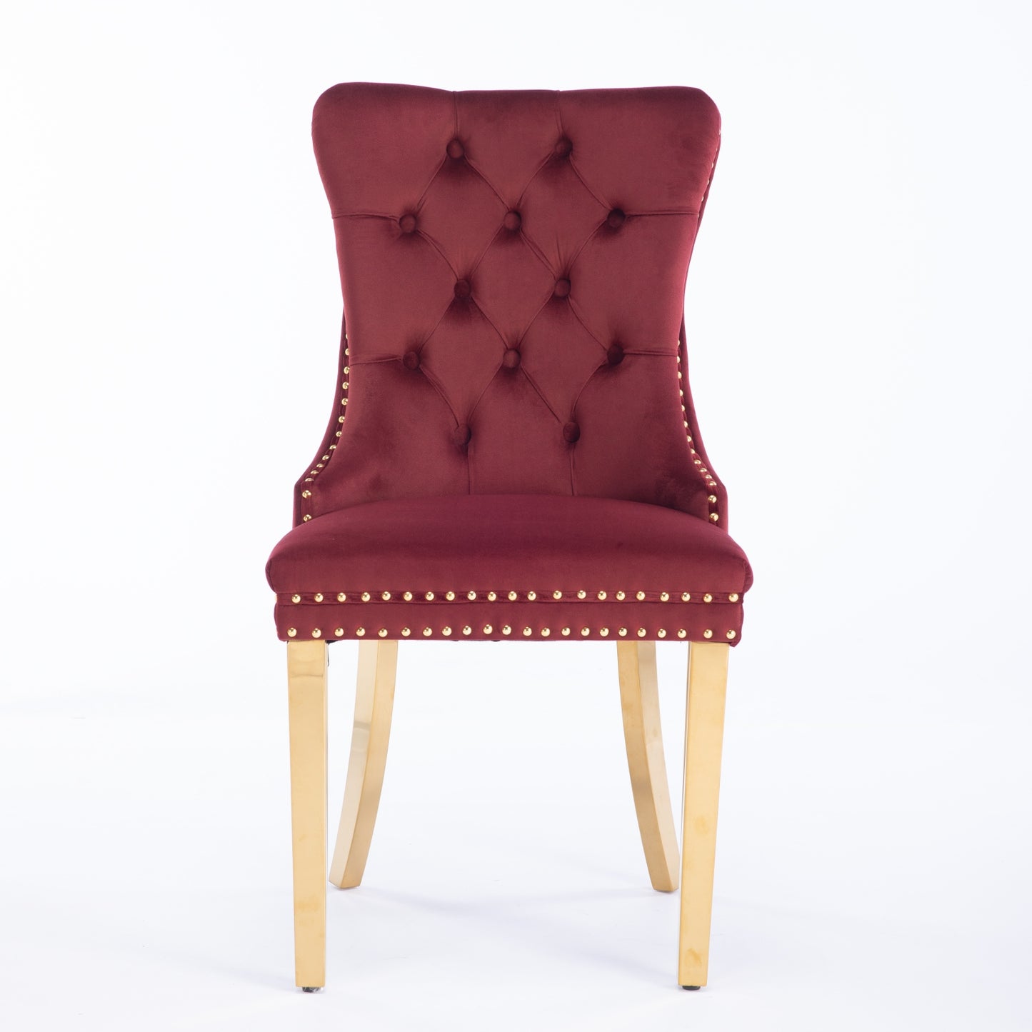 Burgundy velvet dining chair with tufted back and gold nailhead trim