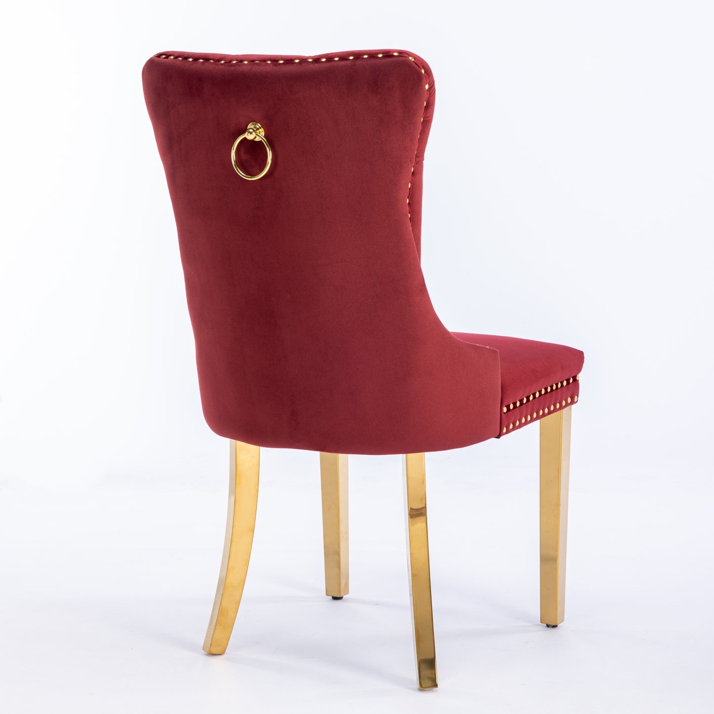 Red velvet dining chair with gold lion knocker and gold legs