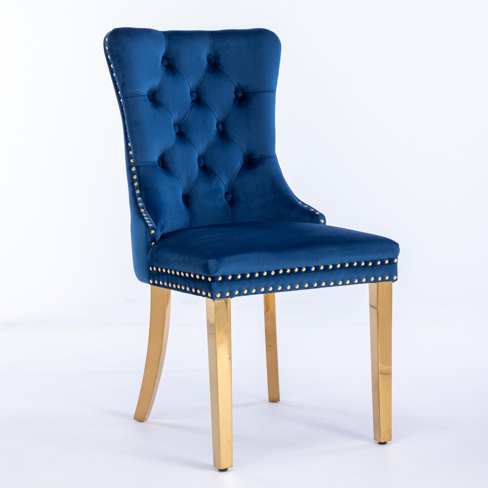 Deep blue velvet accent chair with gold nailhead trim and brass legs