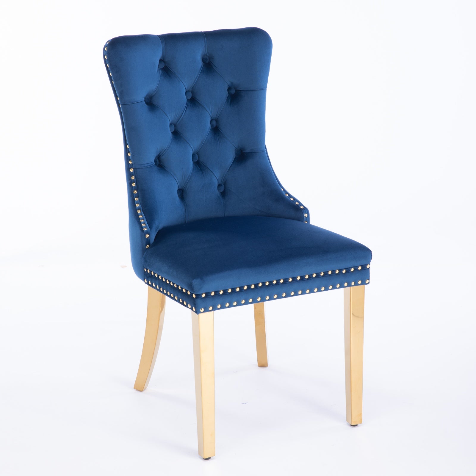 Elegant blue velvet dining chair with diamond tufting and gold nailhead trim
