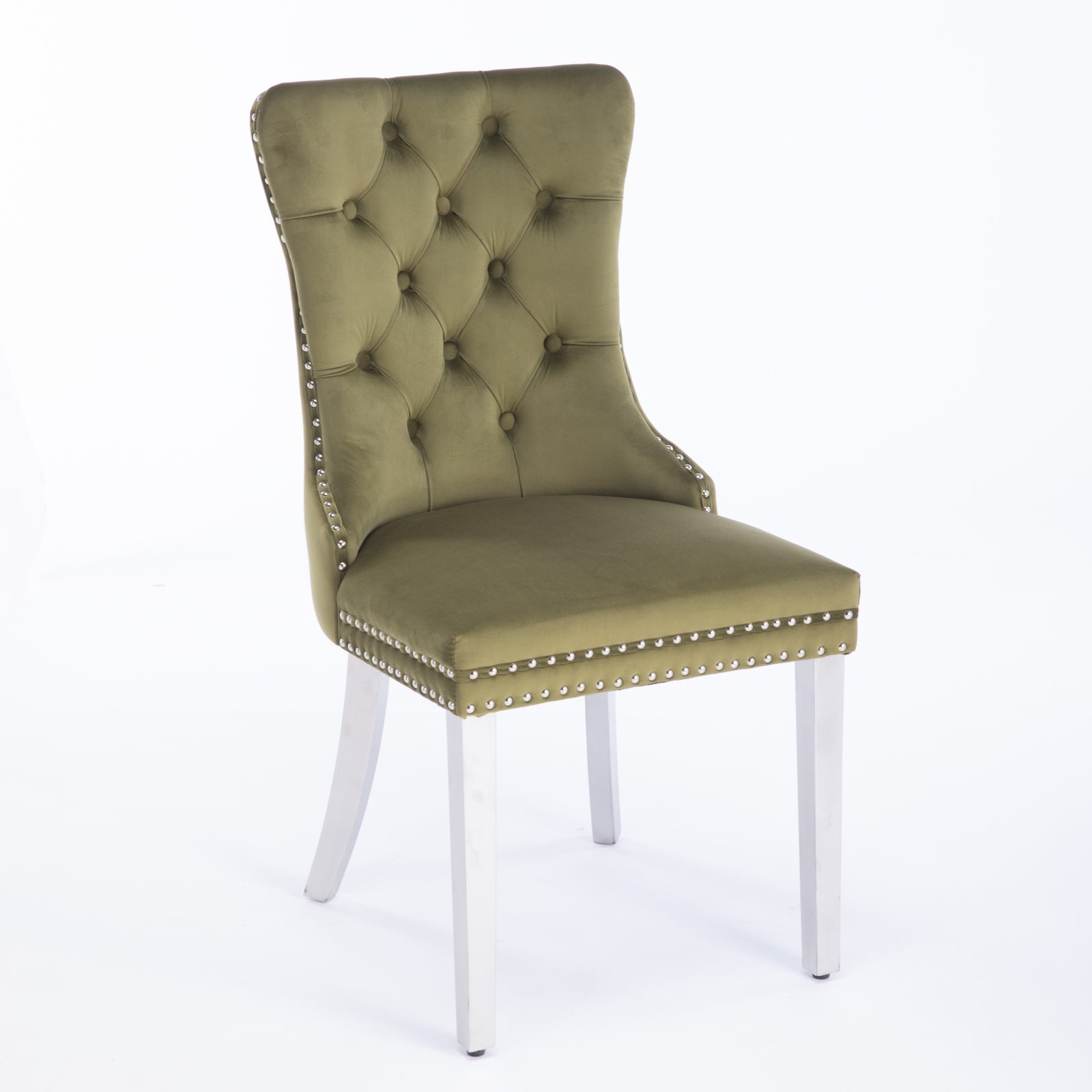 Olive green velvet dining chair with button tufting and silver nailhead trim