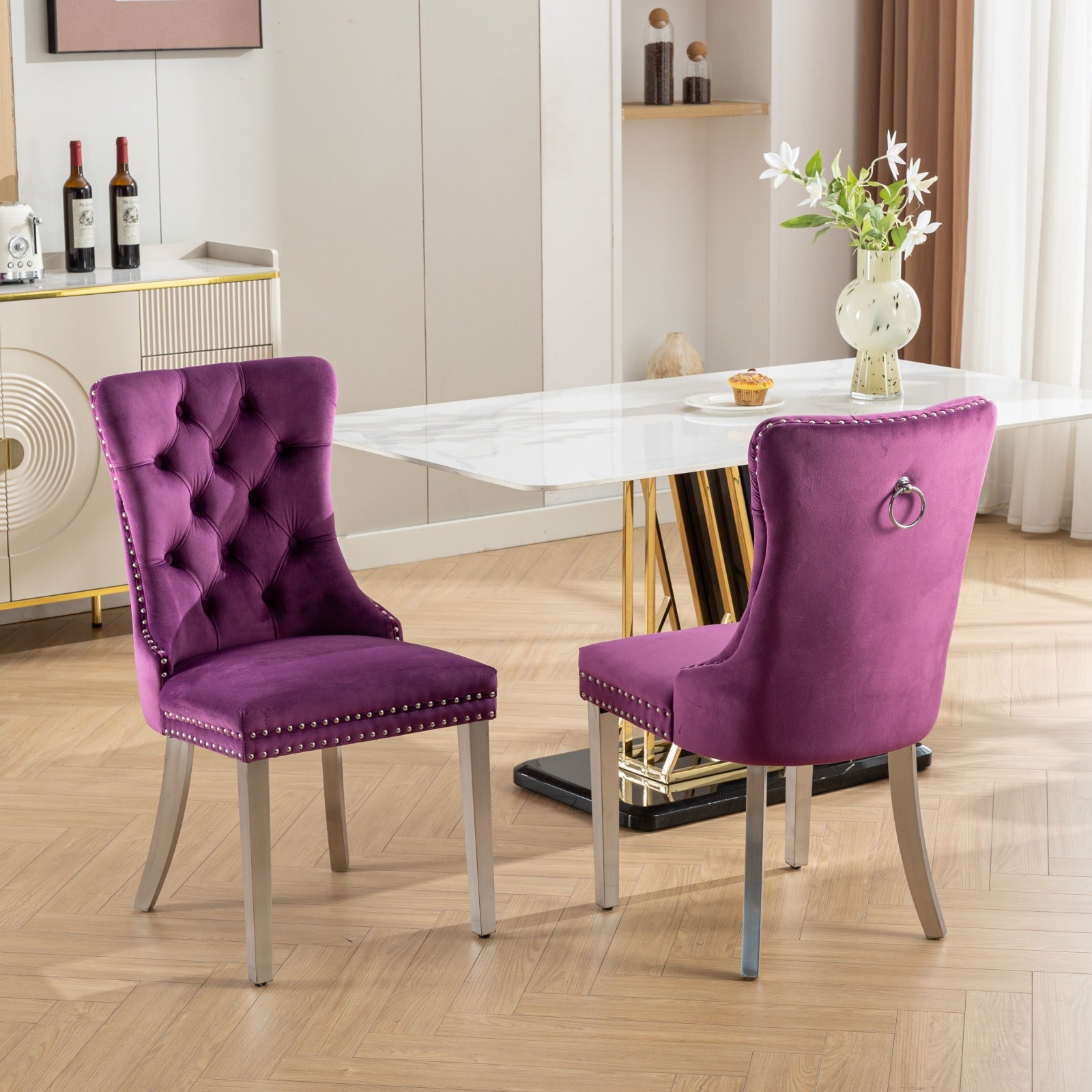 Purple velvet tufted dining chair with silver nailhead trim