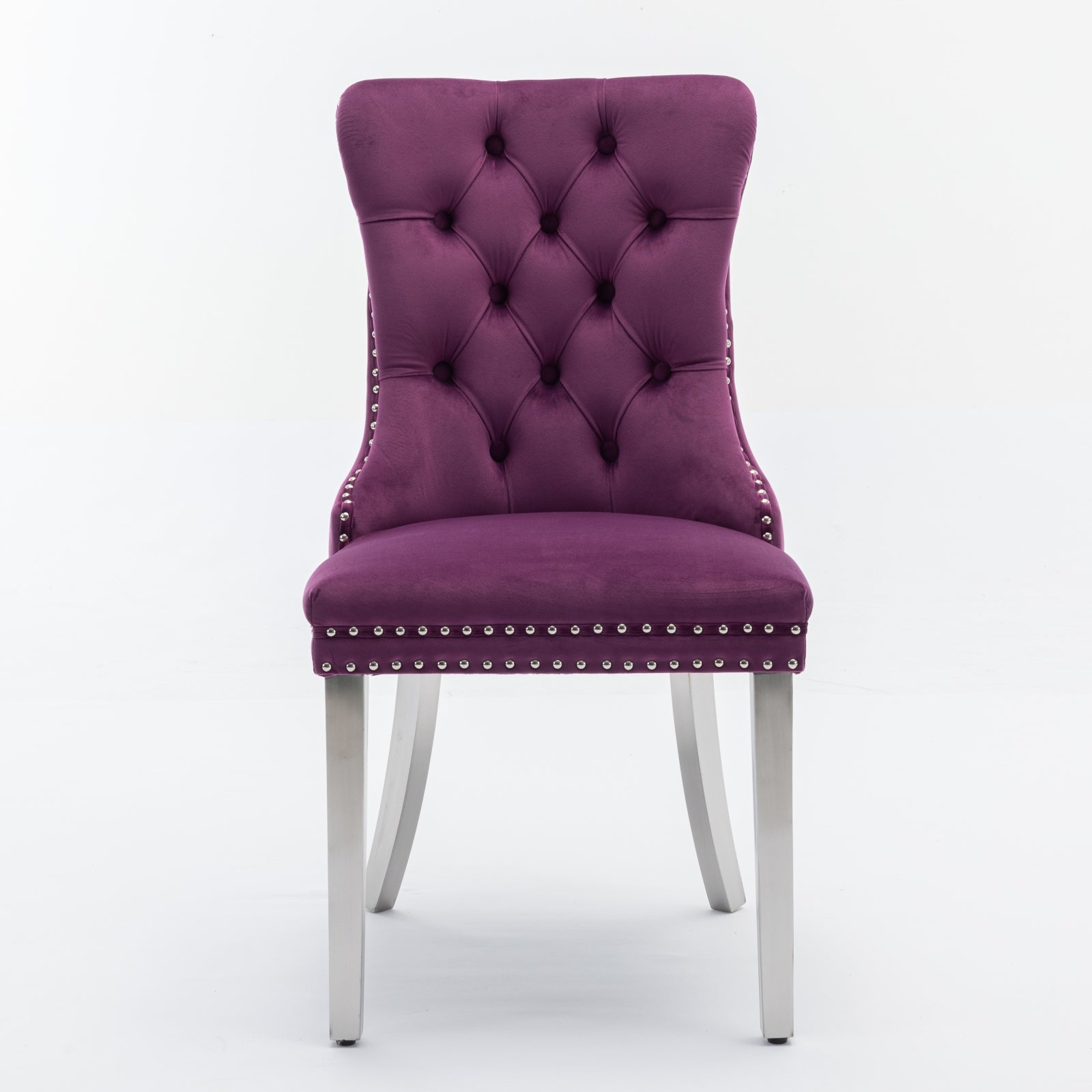 Plush purple velvet dining chair with diamond tufting and silver nailhead trim