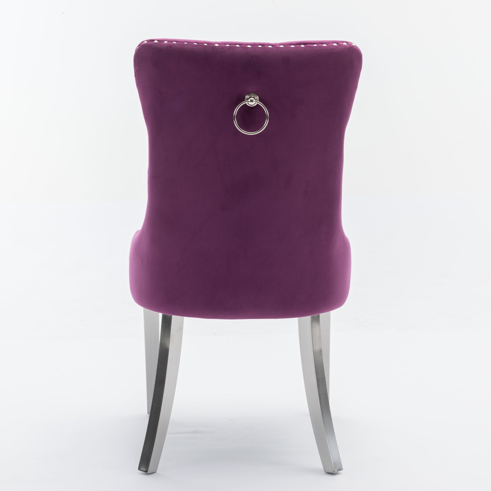 Plush purple velvet dining chair with silver ring pull and nailhead trim