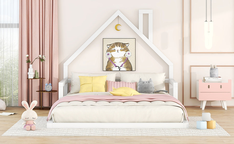 White wooden house bed frame with cartoon cat art and pink curtains