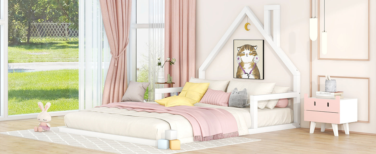 White wooden house bed frame with pink bedding and decor