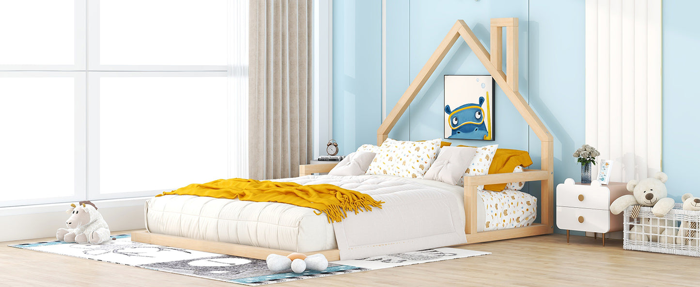 Wooden house frame toddler bed with white bedding and yellow throw