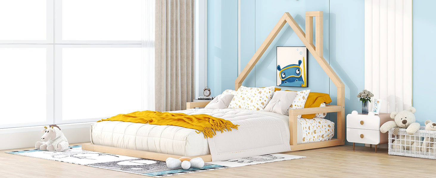 Wooden house frame toddler bed with white bedding and yellow throw