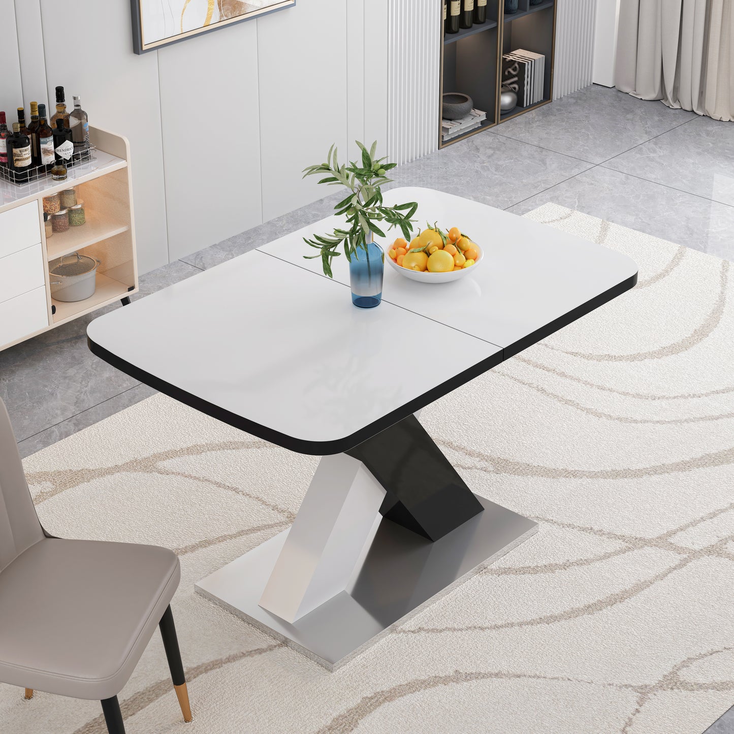 Modern white dining table with a sleek black and chrome pedestal base