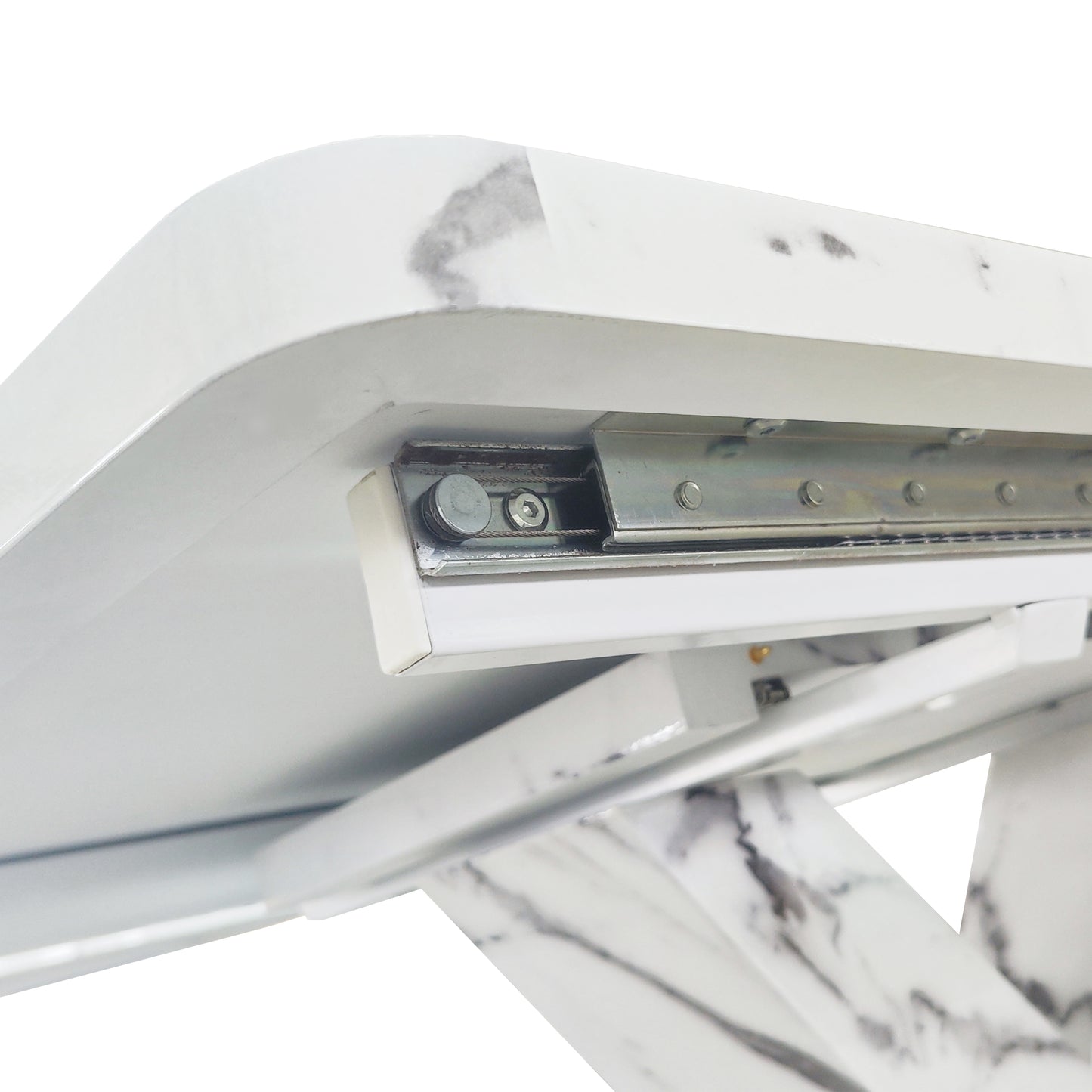 Closeup of a white marble extendable dining table slide mechanism