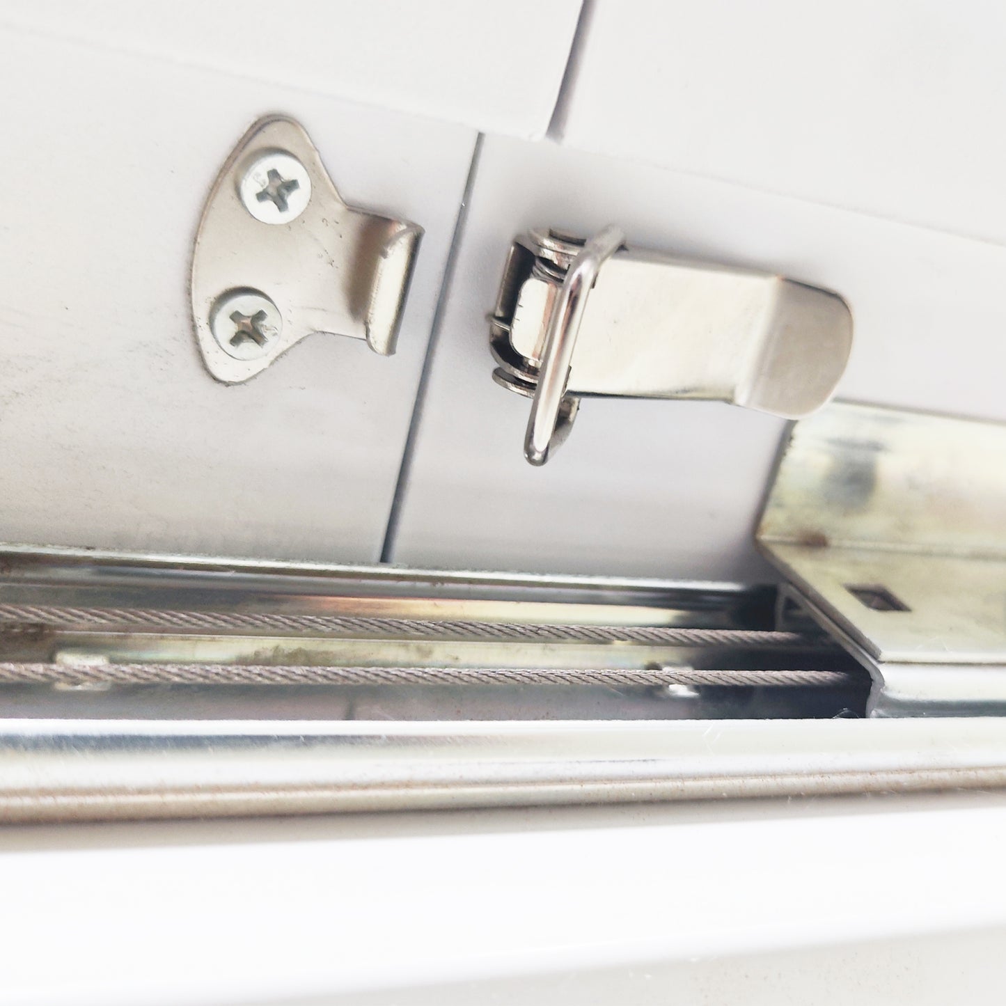 Stainless steel drawer slide latch with two screws