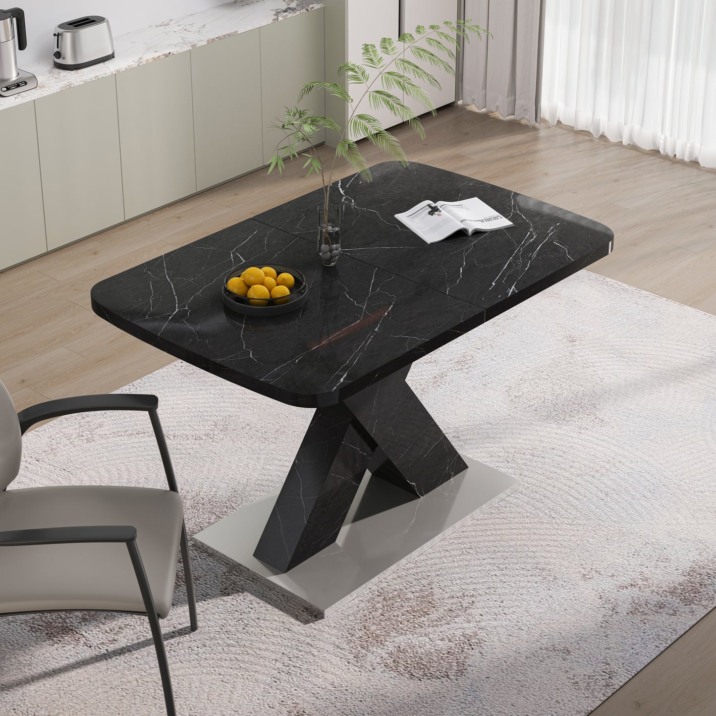 Black marble dining table with a modern pedestal base
