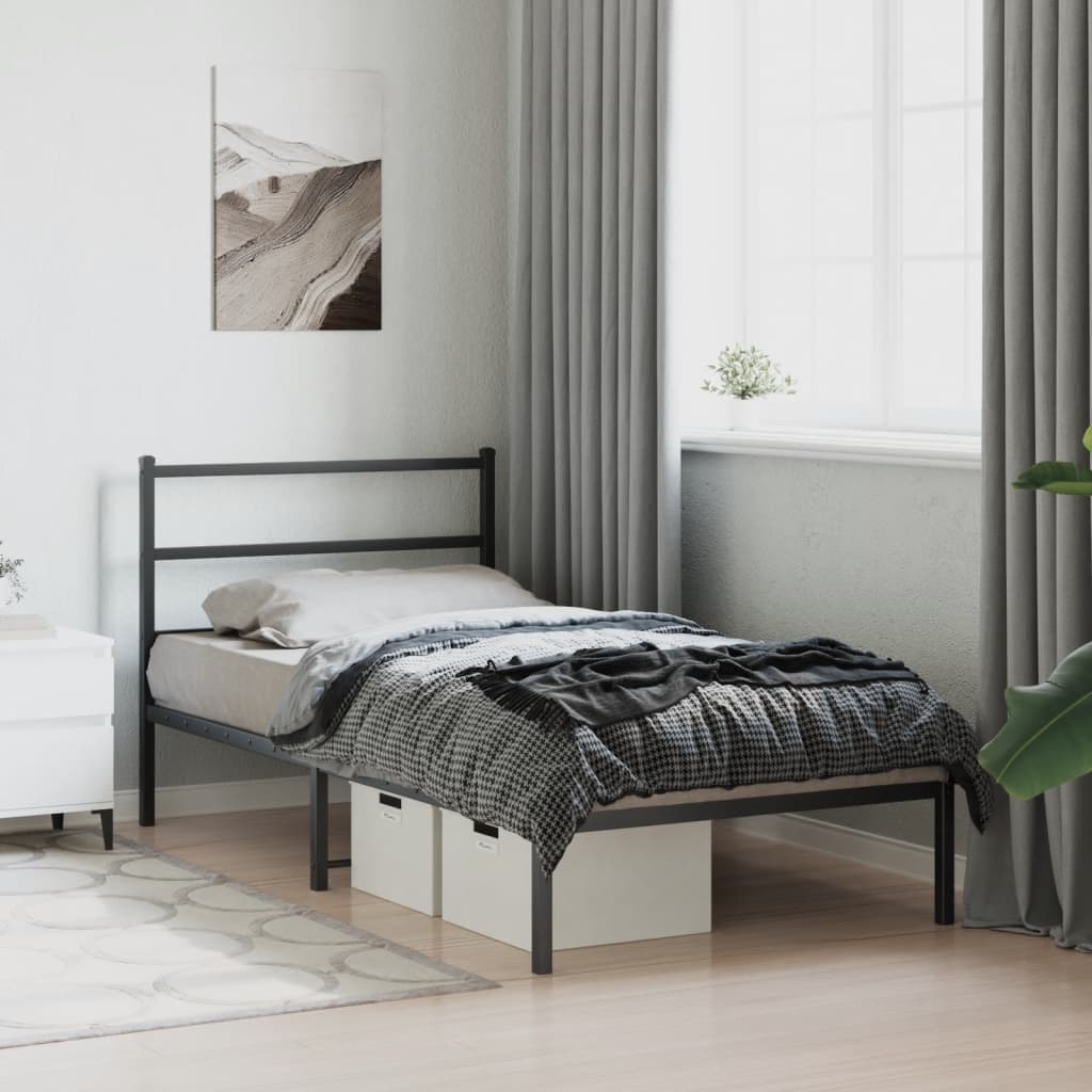Dark gray metal twin bed frame with slatted support and minimalist headboard