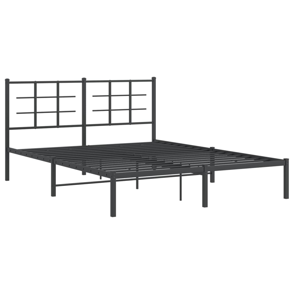 Dark grey metal platform bed frame with a modern grid headboard and bedding