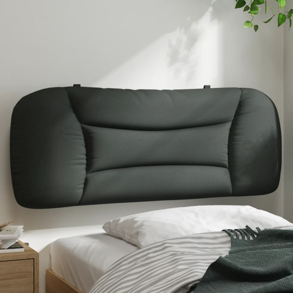 Dark gray upholstered headboard with tufted detailing