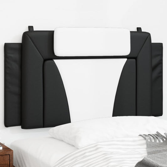 Black and white upholstered headboard with modern geometric design