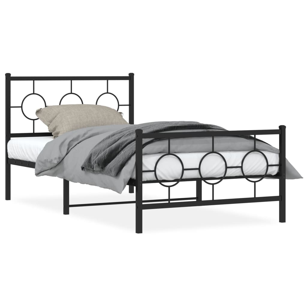 Black metal bed frame with decorative circular headboard and footboard