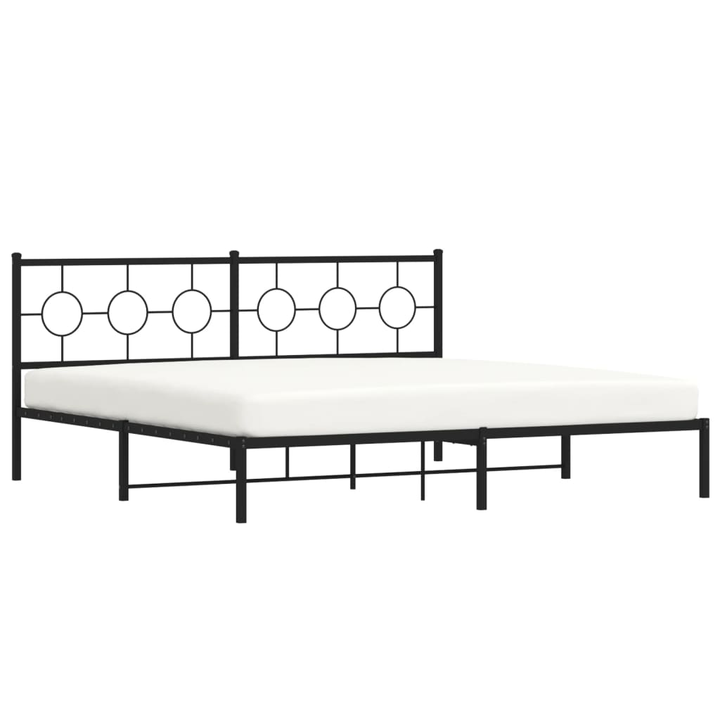 Black metal platform bed frame with decorative circular headboard