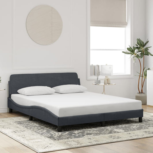 Dark gray fabric platform bed frame with curved headboard and footboard