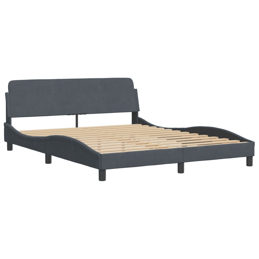 Modern dark gray fabric bed frame with curved headboard and white mattress