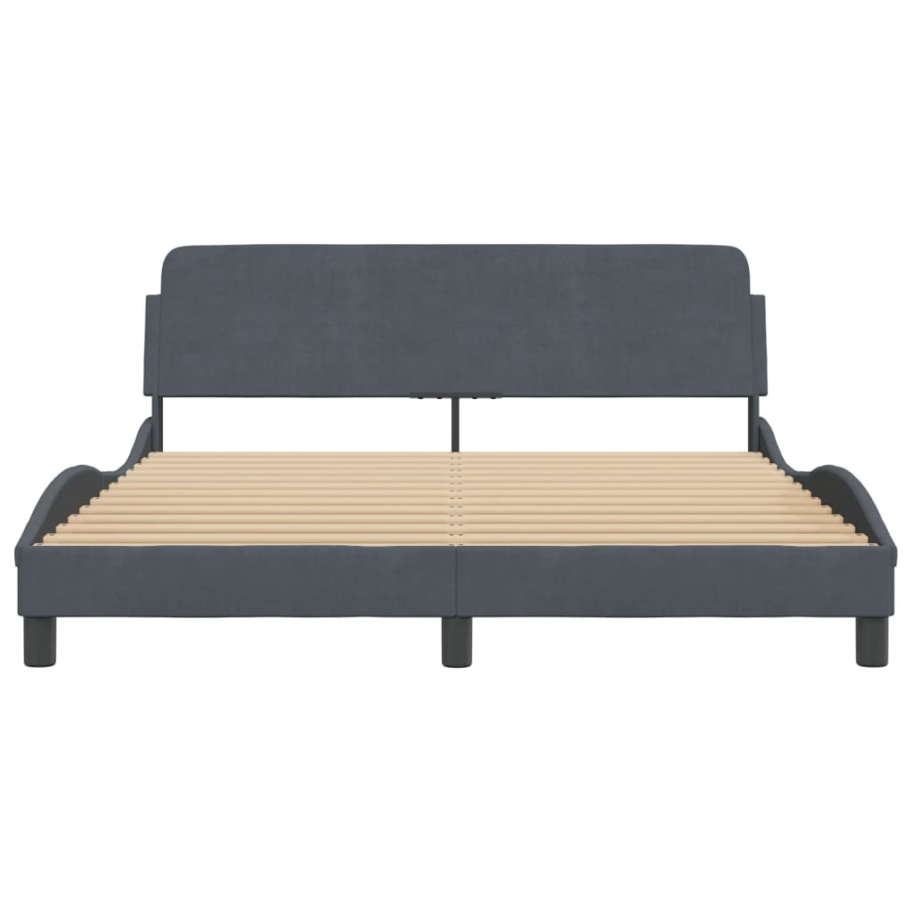Modern grey fabric bed frame with curved headboard and slatted base