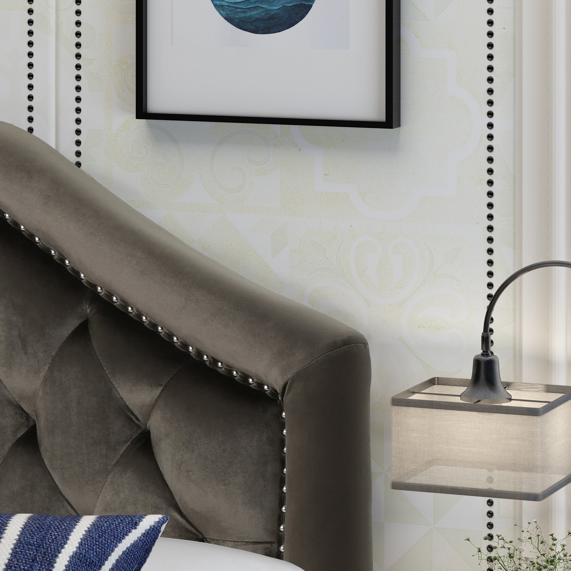 Dark gray velvet headboard with diamond tufting and silver nailhead trim