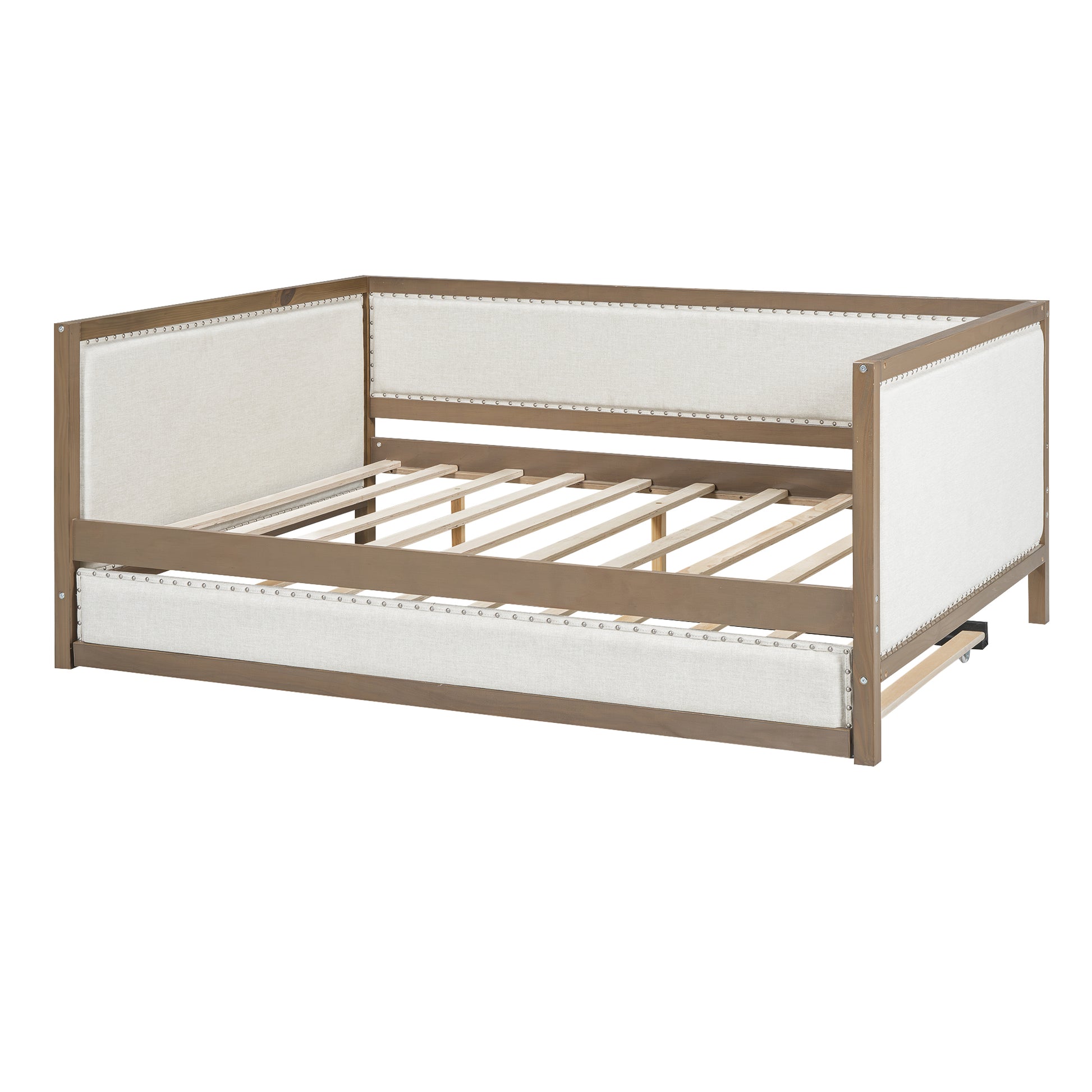 Wooden daybed with beige linen upholstery and nailhead trim
