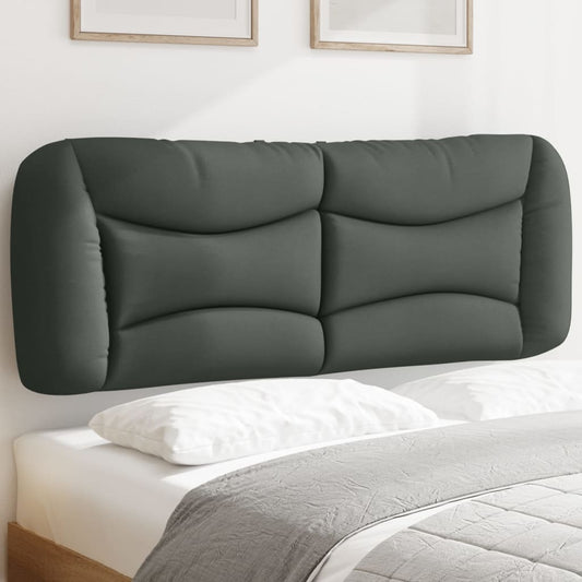 Dark gray upholstered headboard with a modern tufted design
