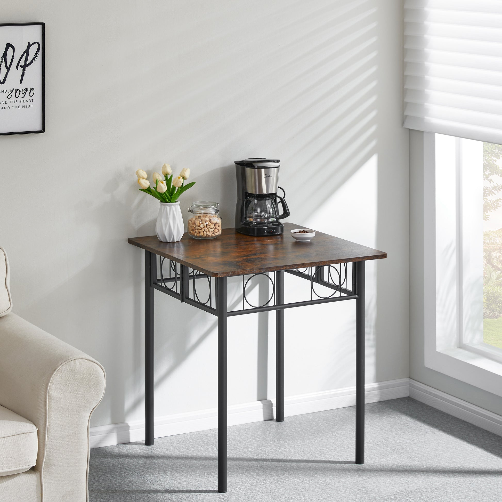 Rustic wood finish dining table with black metal legs and decorative circular accents