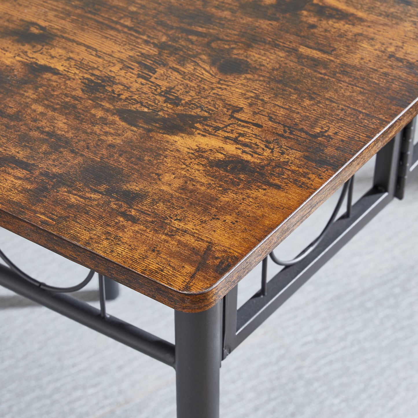 Rustic brown wood grain tabletop with black metal frame