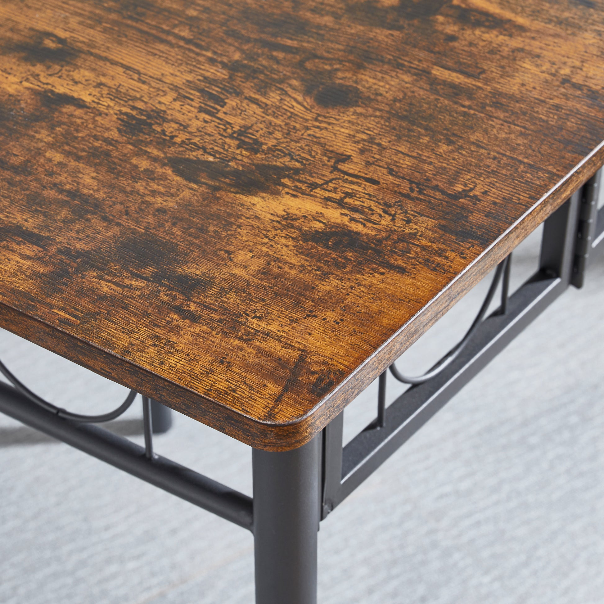 Rustic brown wood grain tabletop with black metal frame