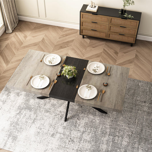 Gray extendable dining table with black accents set for four