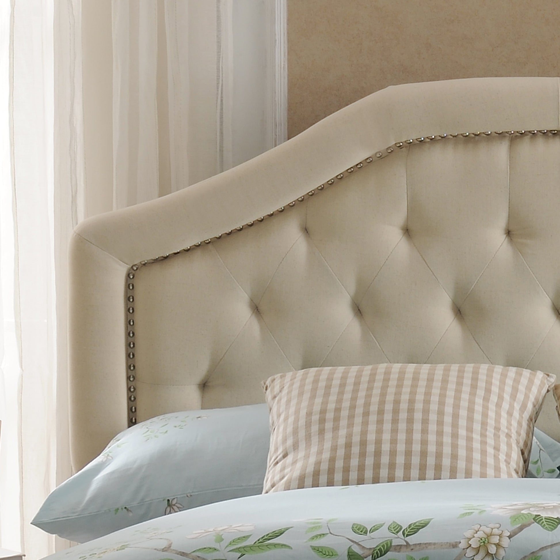Tufted beige fabric headboard with nailhead trim classic bedroom furniture