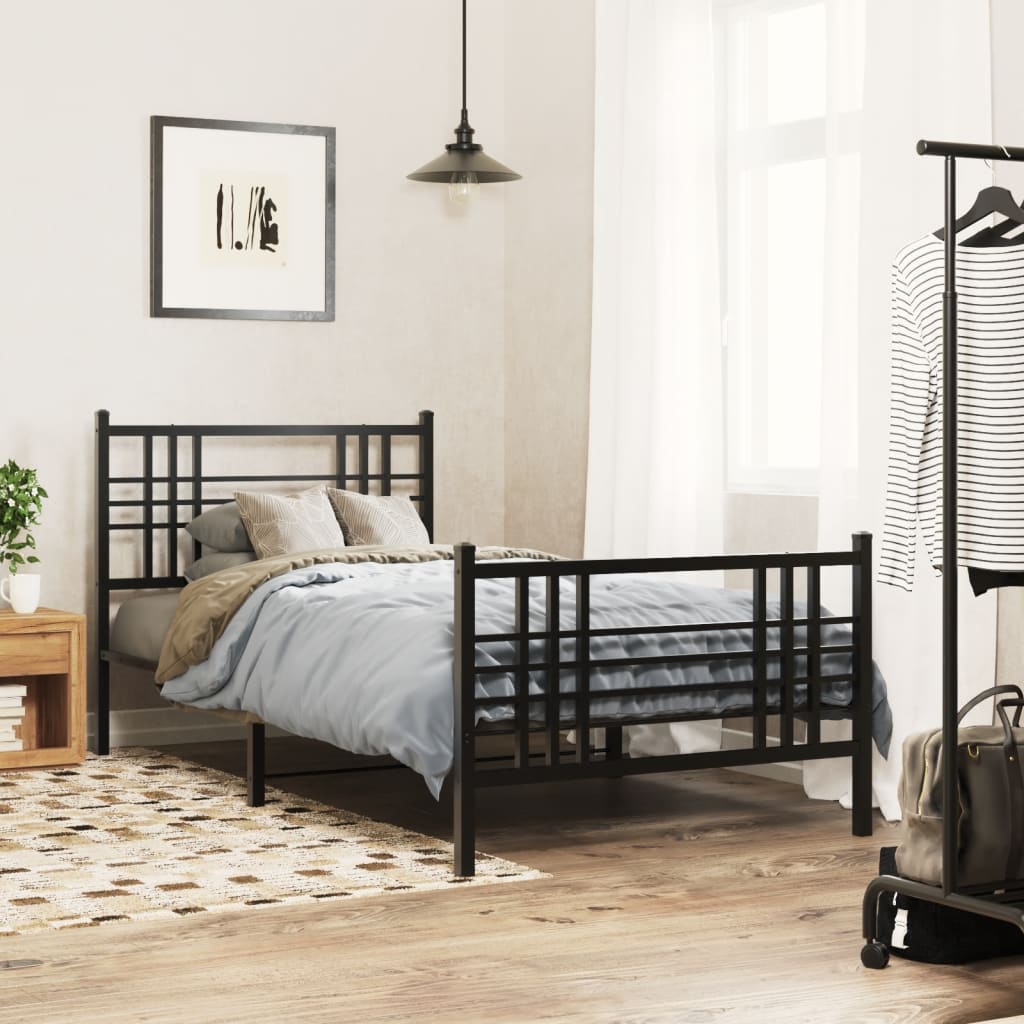 Black metal bed frame with a slatted headboard and footboard