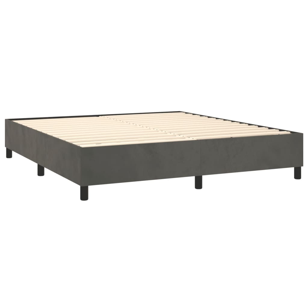 Dark grey upholstered divan bed frame with white mattress