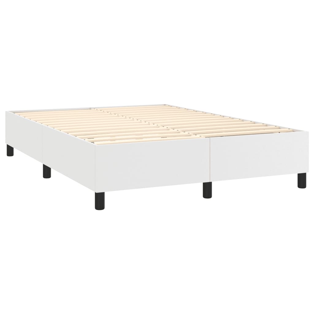 Modern white upholstered bed frame with a thick mattress